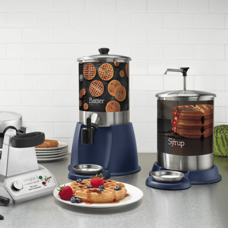 Close-up of the pump action and the stainless steel drip saucer catching a spill.