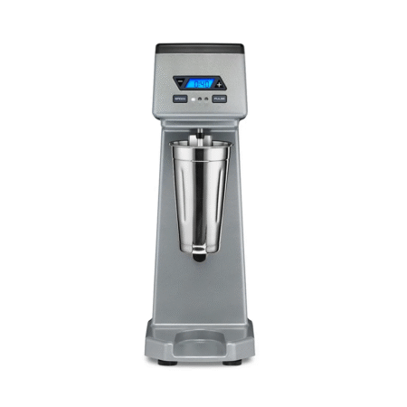 Fully Automatic Cup Activation Hand sliding a stainless steel cup into position to activate the mixer automatically.