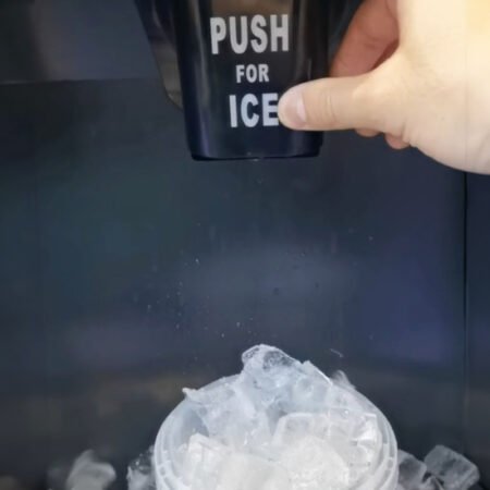 Close-up of ice dispensing lever mechanism on BD150