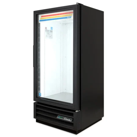 A one-quarter perspective view from the left side of an empty, black True GDM-10-HC commercial refrigerator featuring a single glass swing door, white interior, and a lighted top sign with red, yellow, and blue stripes.