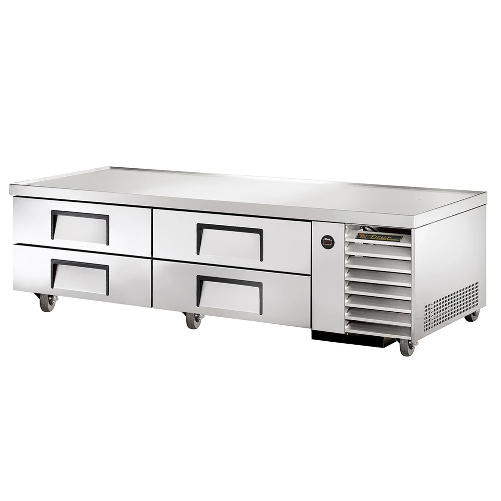True Trcb-79-Hc 79 1/4&Quot; Chef Base W 4 Drawers 115V 1 A Perspective View Of A Stainless Steel True Commercial Chef Base Featuring Four Refrigerated Drawers With Recessed Handles, A Heavy-Duty Flat Top, And A Side-Mounted Ventilation Grille, All Set On Swivel Casters.