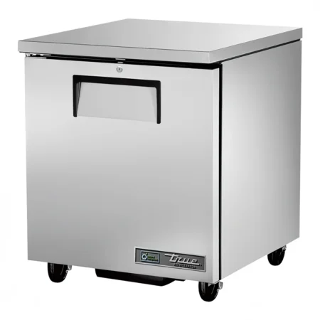A 3/4 perspective view of a True Manufacturing TUC-27-HC-LH undercounter refrigerator. This unit features a stainless steel exterior, a single solid door hinged on the left with a black recessed handle, and a key lock located above the handle. The unit is elevated on four heavy-duty swivel casters.