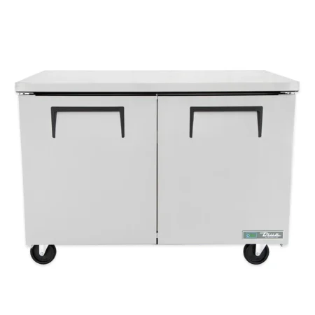 Front view of a True TUC-48 stainless steel undercounter refrigerator with two solid doors, black recessed handles, and heavy-duty casters.