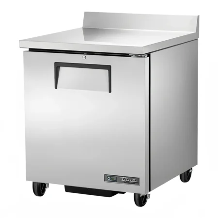 A single-door stainless steel True Refrigeration worktop refrigerator featuring a recessed handle, built-in backsplash, and heavy-duty casters.