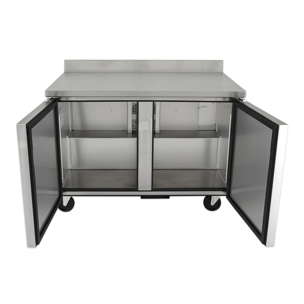 True Twt-48-Hc 48&Quot; Worktop Refrigerator W 2 Sections 115V 5 The Open Interior Of A True Twt-48 Worktop Refrigerator Showing Four Adjustable Pvc-Coated Wire Shelves, A Clear-Coated Aluminum Liner, And A Stainless Steel Floor With Coved Corners.